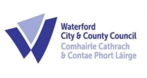 Logo of Waterford City and County Council, featuring a stylized 'W' in purple and blue against a white background, accompanied by the council's name in English and Irish (Comhairle Cath